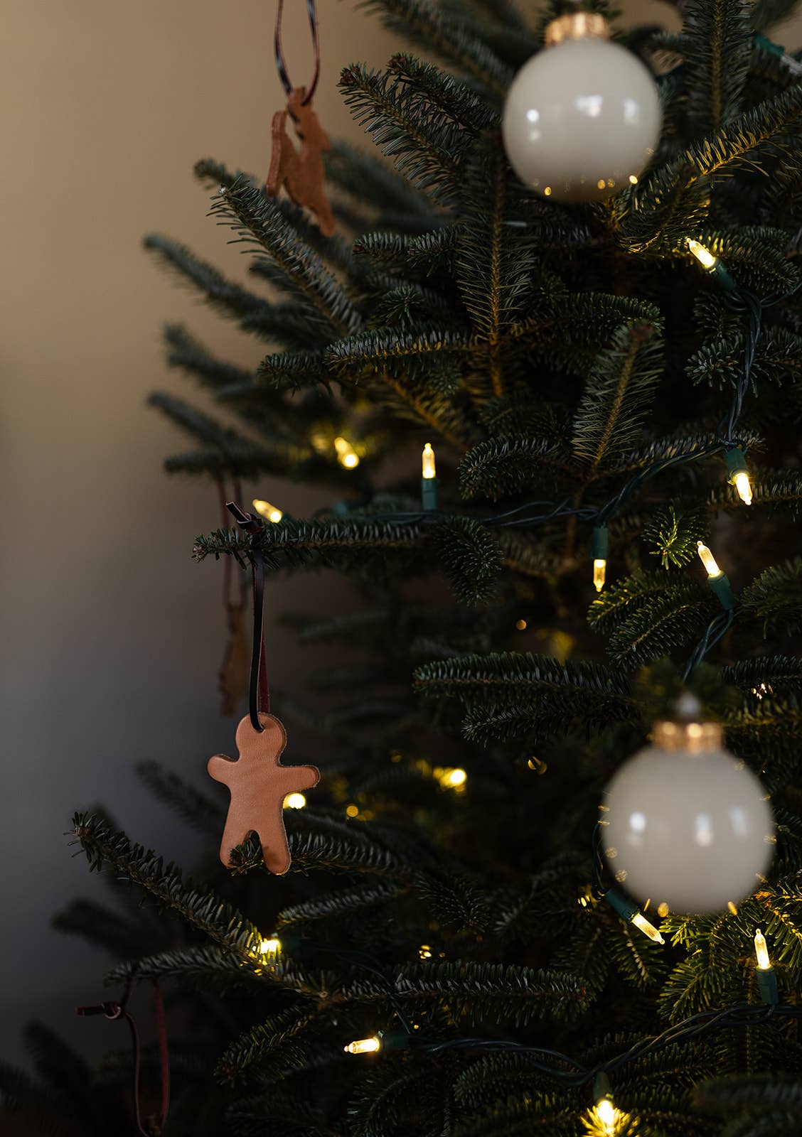 The Leather Christmas Ornament: Tobacco / Dove